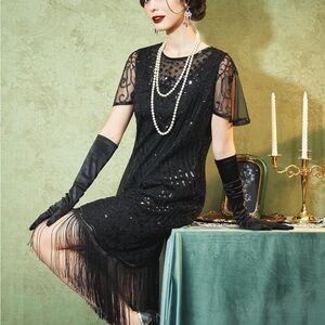 Elegant Black Beaded Dress with Fringe